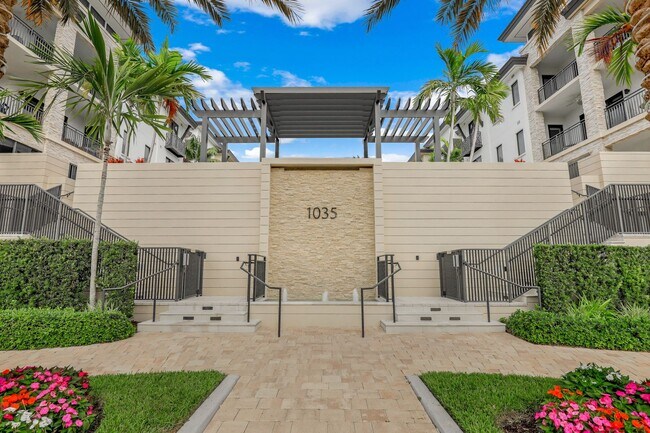 Building Photo - Luxury Living Meets Prime Location! Naples Square 2/2 Condo with Expansive Terrace