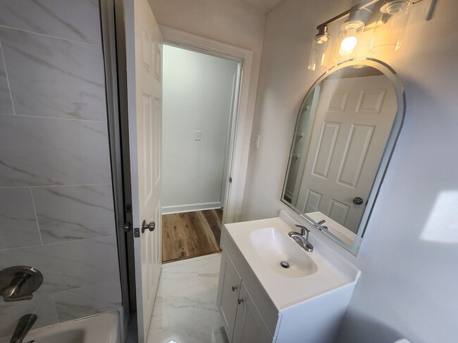 Building Photo - Newly updated 3 bedroom 1.5 bath home for rent with partial finished basement with additional bed...