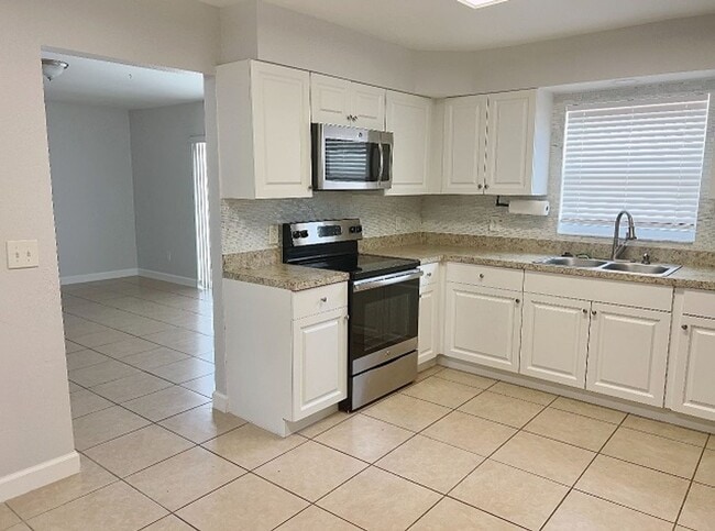 Building Photo - AUGUST MOVE IN FOR THIS RANCH STYLE HOME I...