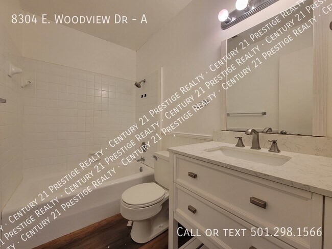 Building Photo - 8304 Woodview Dr N