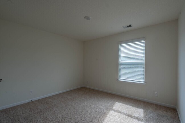 Building Photo - Newly built 3 bedroom and 2.5 bath home with garage.