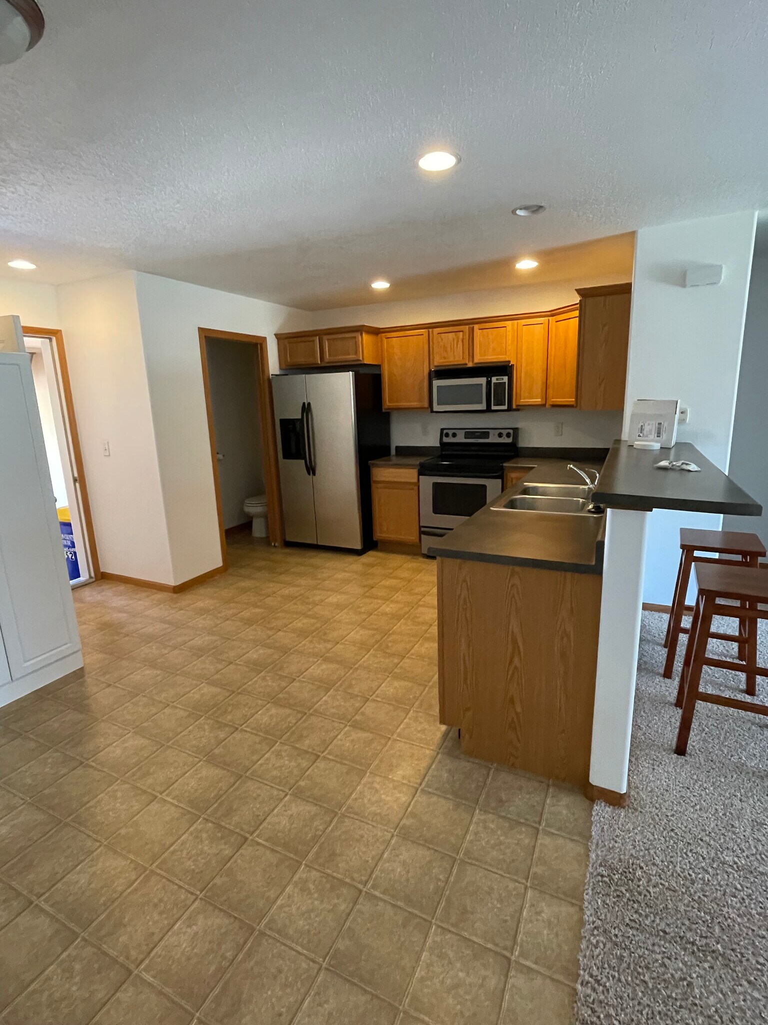 Kitchen with half bathroom - 152 Alydar Dr
