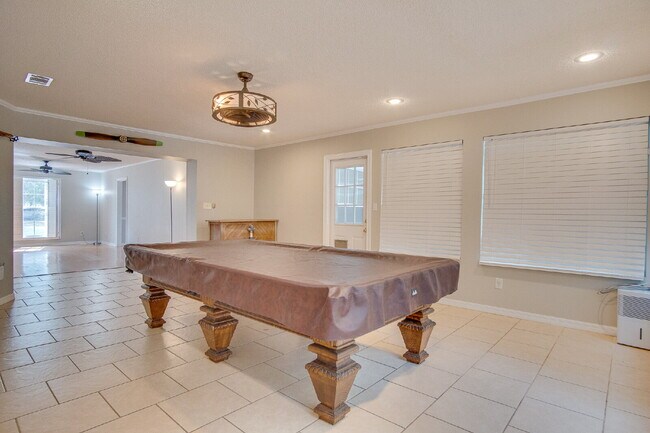 Building Photo - Pool Home with Office, Two Primary Suites ...