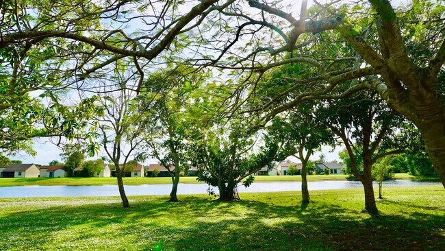 Building Photo - Waterfront 3BR Home on Canal | Spacious Yard | Lawn Care Included | Pet Friendly