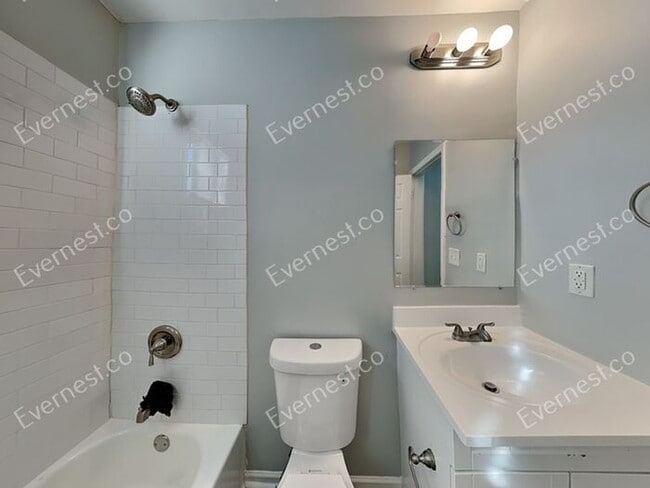 Building Photo - Charming 2BR Duplex with Modern Comfort an...