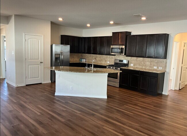 Building Photo - "Charming 4-Bedroom Home with Granite Eleg...