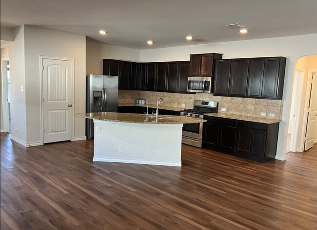 Building Photo - "Charming 4-Bedroom Home with Granite Elegance in San Antonio!"