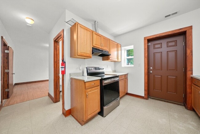 Building Photo - 6540 S Vernon Ave