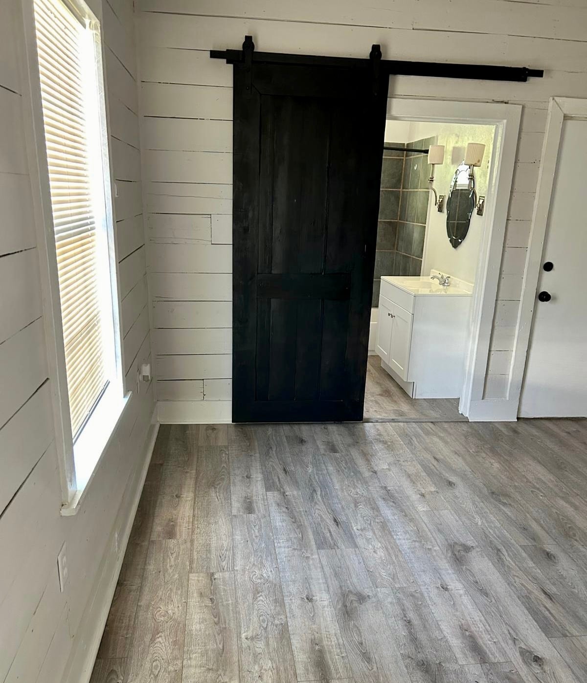 Barn door into bathroom - 810 Aganier Ave
