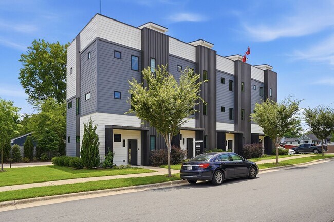 Building Photo - Live Elevated in Downtown Raleigh – Stunning Townhome with Rooftop Oasis!