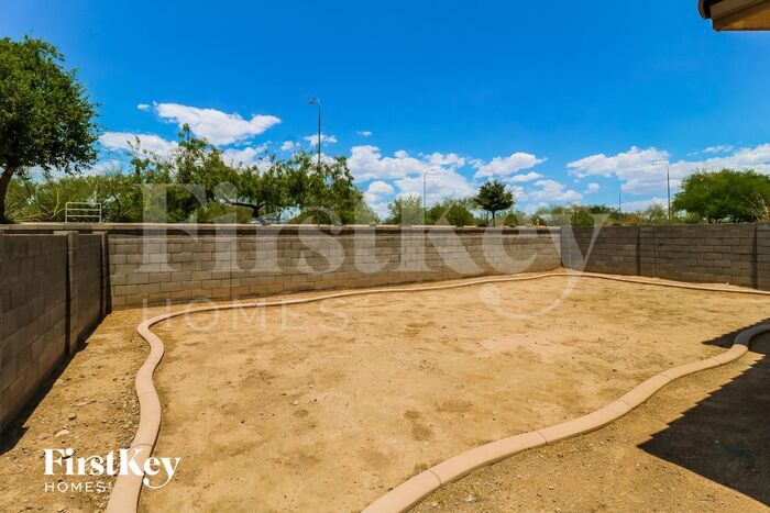Building Photo - 10946 W College Dr