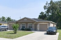 Building Photo - Spacious 3BR/2BA Duplex with Private Garage – Carpet-Free!