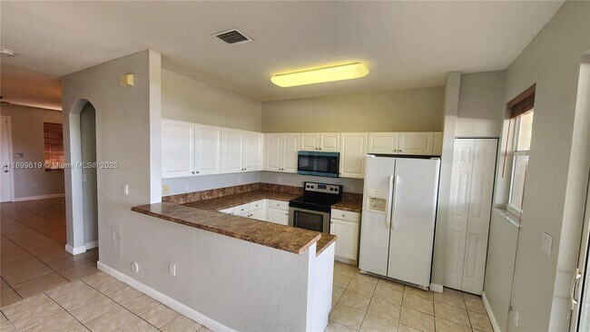 Building Photo - 12813 SW 132nd Terrace