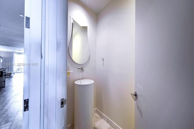 Building Photo - 10203 Collins Ave