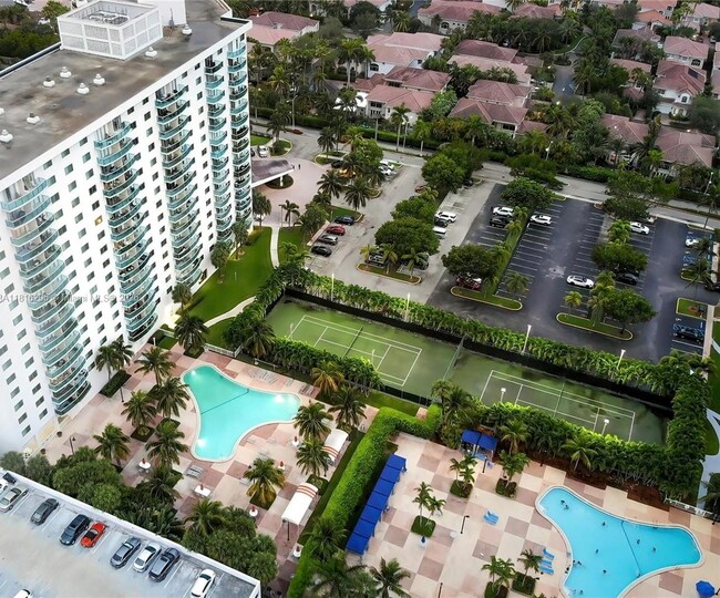 Building Photo - 19380 Collins Ave