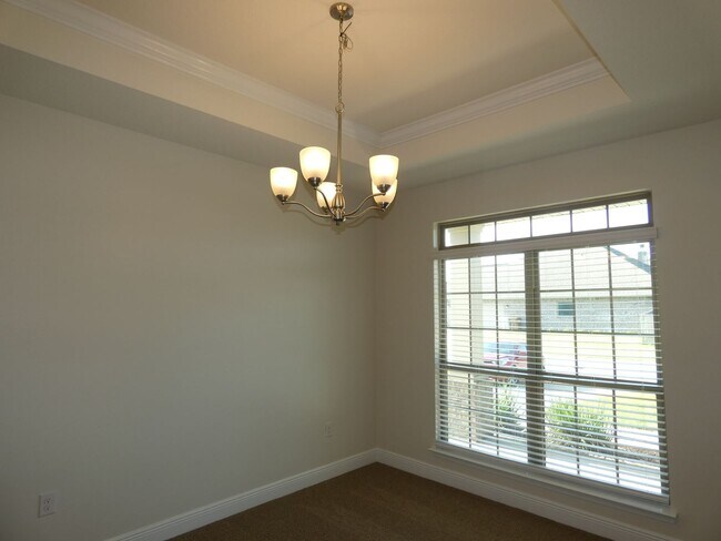 Building Photo - Spacious 5-Bedroom Home - Heart of Pace