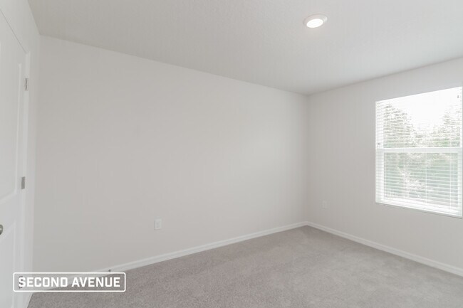 Building Photo - 10774 N Academy Dr