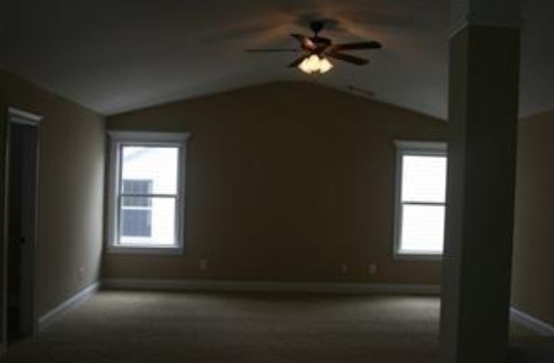 Master Bedroom with ceiling fan. - 319 Haywood Dr