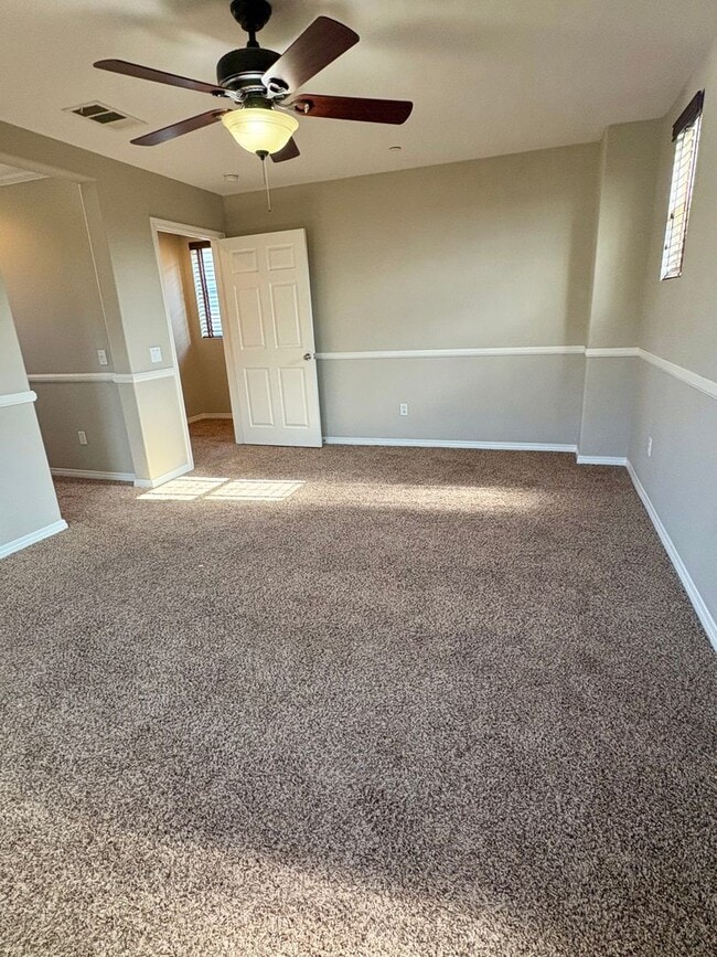 Building Photo - Tri-Level Condo within Walking Distance to...