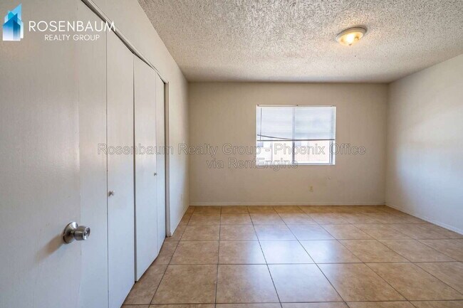 Building Photo - 6440 E Alder Ave