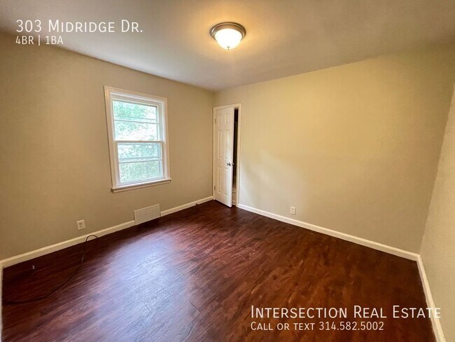 Building Photo - 303 Midridge Dr