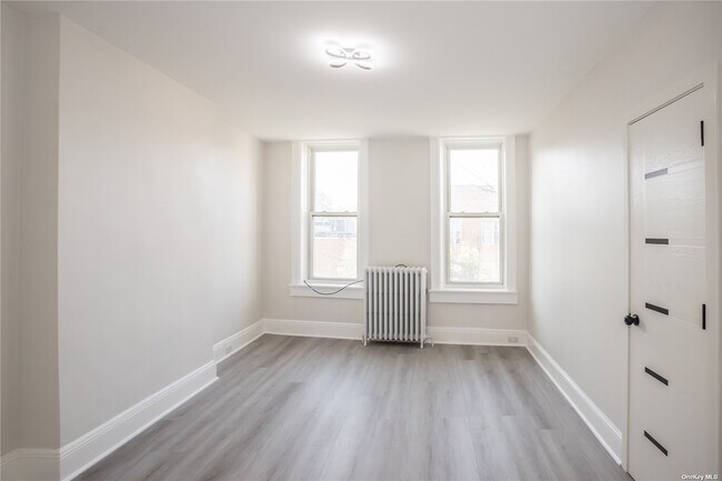 Building Photo - 67-17 Myrtle Ave