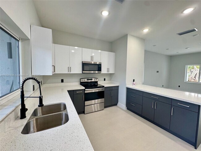 Building Photo - 1445 NW 42nd St