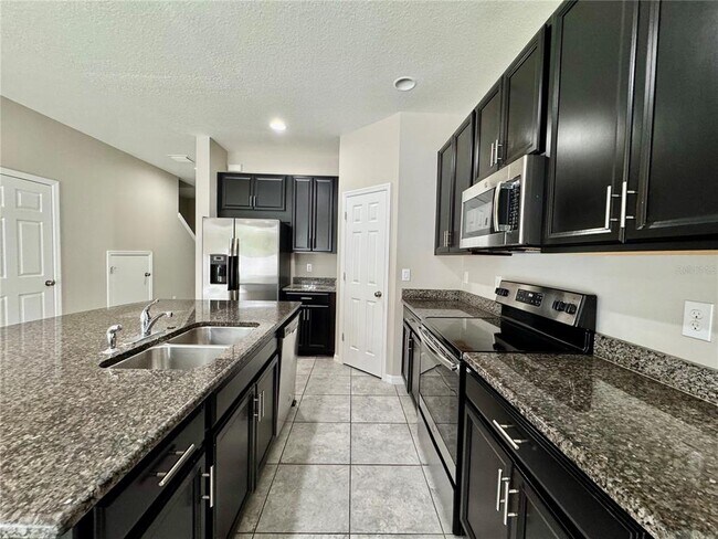 Building Photo - 7208 Grand Elm Dr