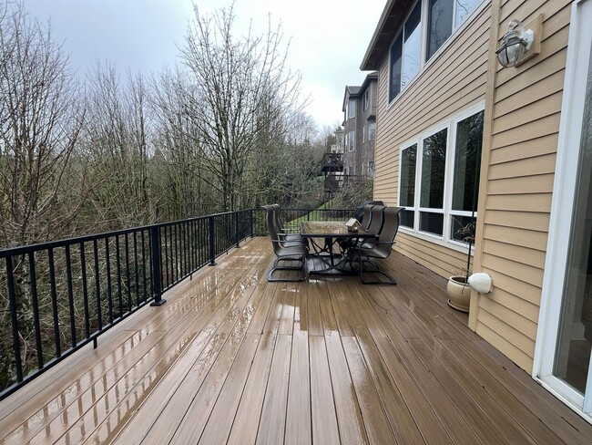 Building Photo - Executive-Style Northwest Heights Home with Forest Views and Refined Architectural Details