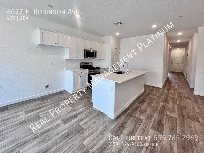 Building Photo - 6077 E Robinson Ave