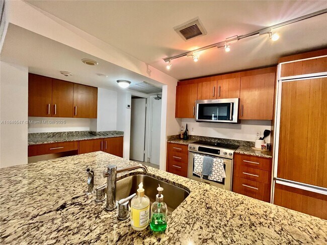 Building Photo - 10275 Collins Ave