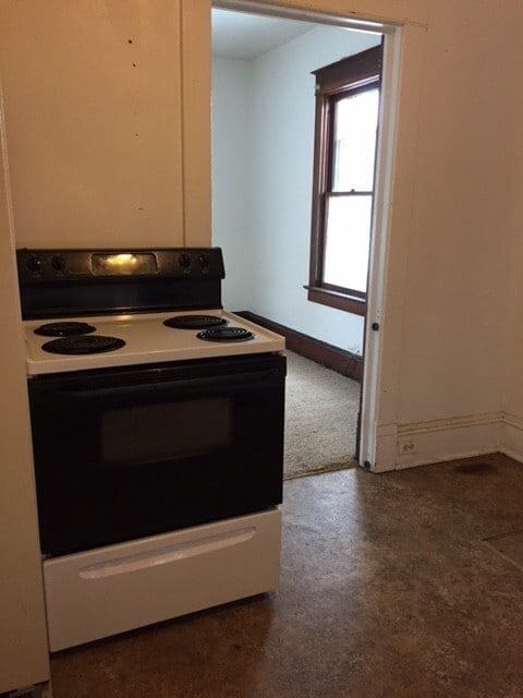 Building Photo - Corner lot with fenced yard!