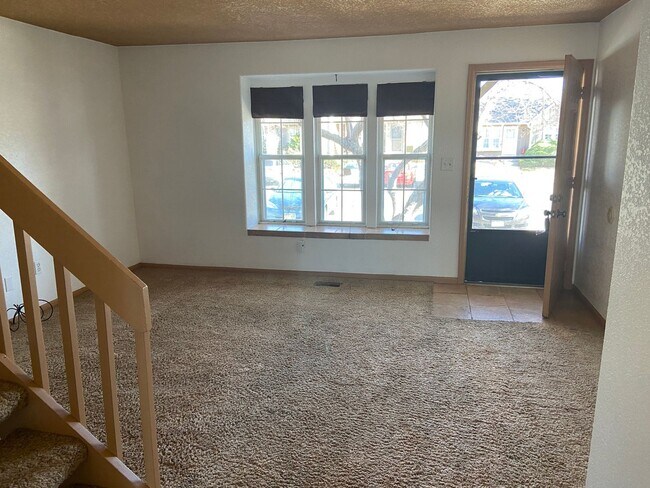 Building Photo - 9606 W Chatfield Ave