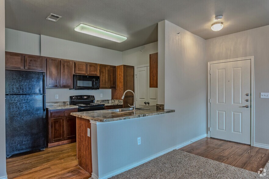 1BR, 1BA - 735 SF A1 - Kitchen - Sunset Lodge