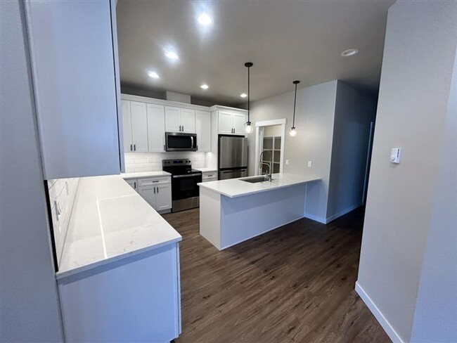 Building Photo - Brand New Construction Three Bedroom Condo...