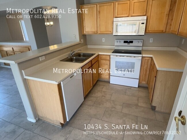 Building Photo - 10434 S Santa Fe Ln