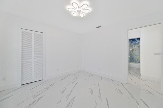 Building Photo - 3832 Sabal Springs Blvd
