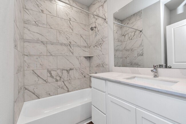 Building Photo - Welcome to the Holly — Spacious Comfort, Modern Style.