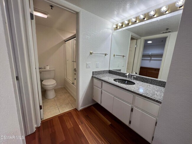 Building Photo - Welcome to this beautifully situated first-floor end unit