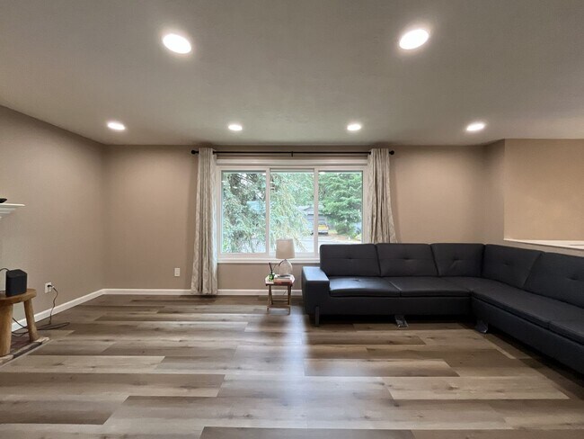 Building Photo - Three-Bedroom Home Near Nike Campus with Bonus Room, Large Deck & Two-Car Garage