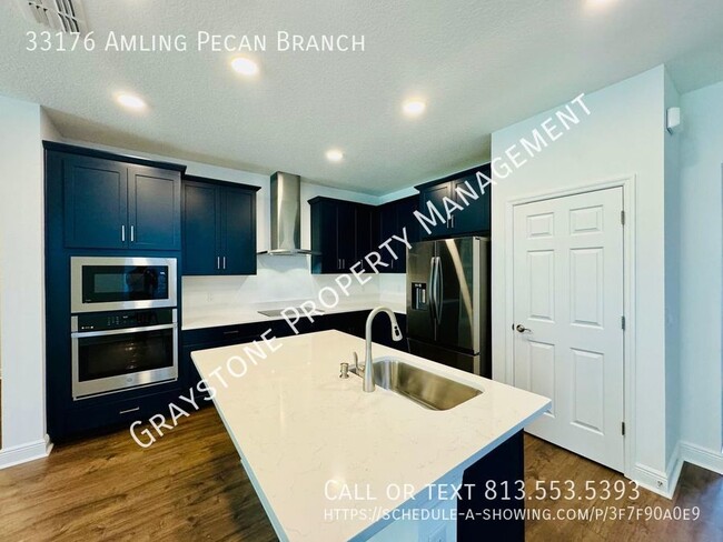 Building Photo - "Luxury Living in Wesley Chapel: Spacious ...