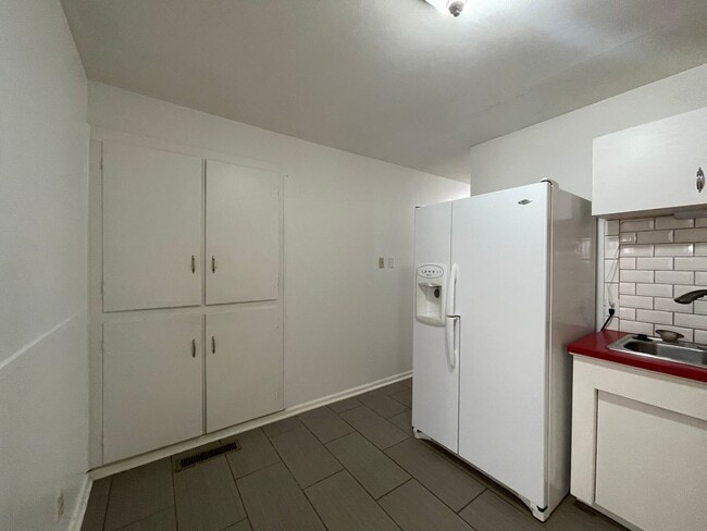 Building Photo - Your New Snyder Sanctuary: Modern Updates, Massive Storage & a Cozy Porch