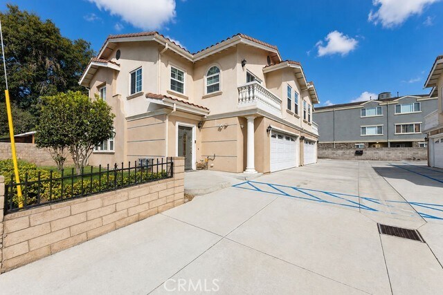 Building Photo - 7592 Artesia Blvd