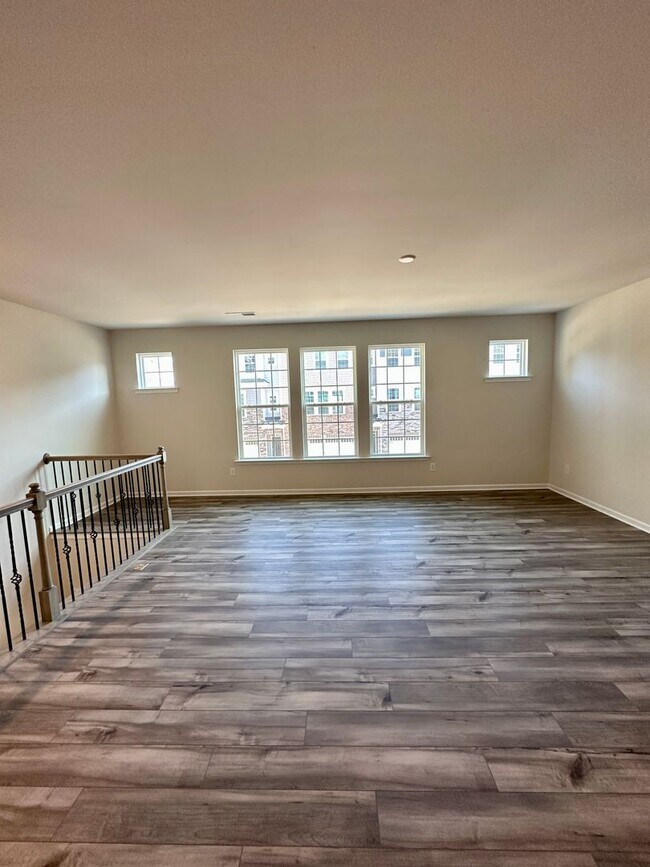 Building Photo - 4BR/3.5 Bath Townhouse in Prime Ballantyne Location; Great Schools