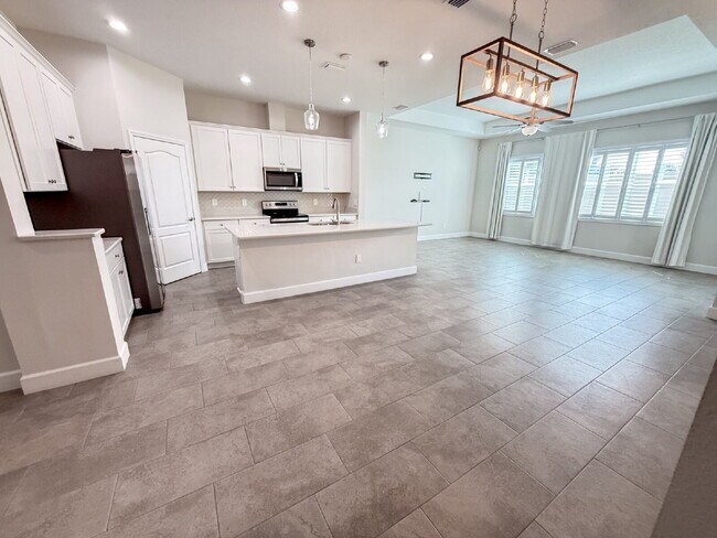 Building Photo - Elegant  2 bed, 2 bath Villa in BridgeWater Landing 55+ community – Maintenance-Free Living at It...