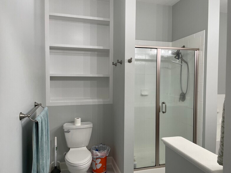 Built-in storage shelves in bathroom - 145 Pier View St