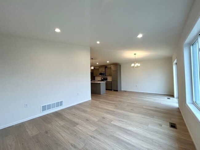 Building Photo - Spacious & Stylish 4-Bed Home with Modern Finishes and Attached 2-Stall Garage