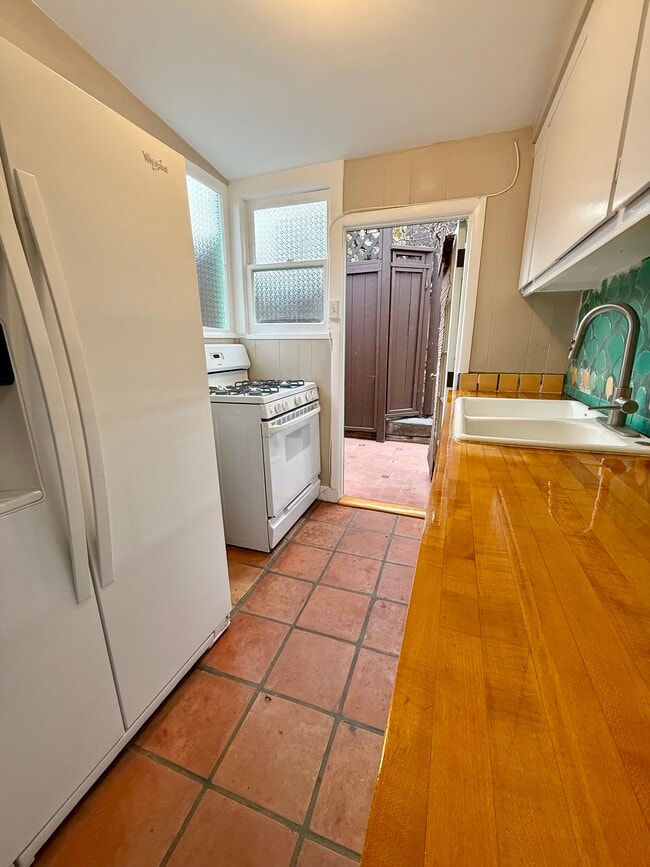 Full size refrigerator and gas oven - 2707 Strongs Dr