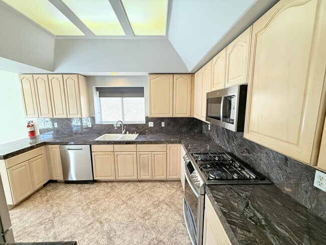 Building Photo - Spacious 4-Bedroom Home with Pool & Spa in...