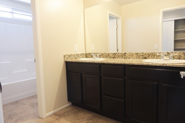 Building Photo - Brand New Gated 4-Bed, 3-Bath Townhome wit...